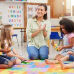 shot-of-a-teacher-singing-with-her-preschool-children.jpg