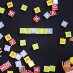 kindergarten-kids-playing-wooden-alphabets-letters-vocabulary-ga-1.jpg